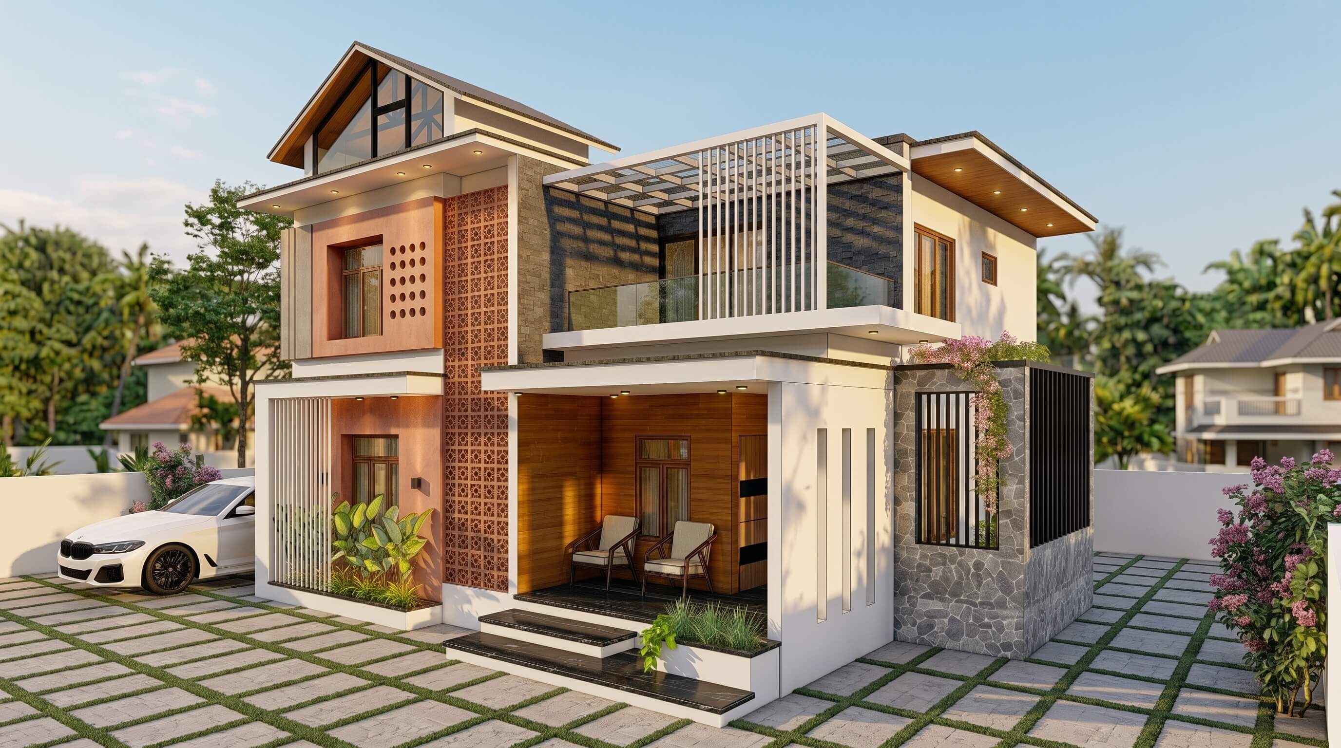 Front garden view of a contemporary Kerala house with tropical planting