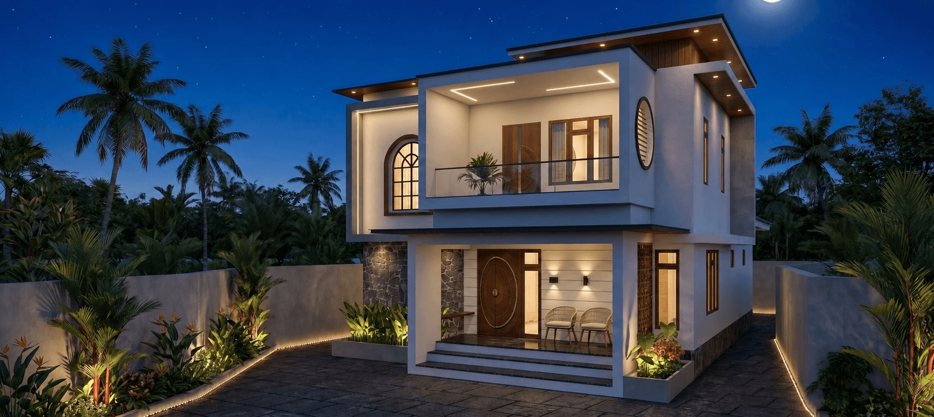 Night facade view of a Kerala home with warm exterior lighting